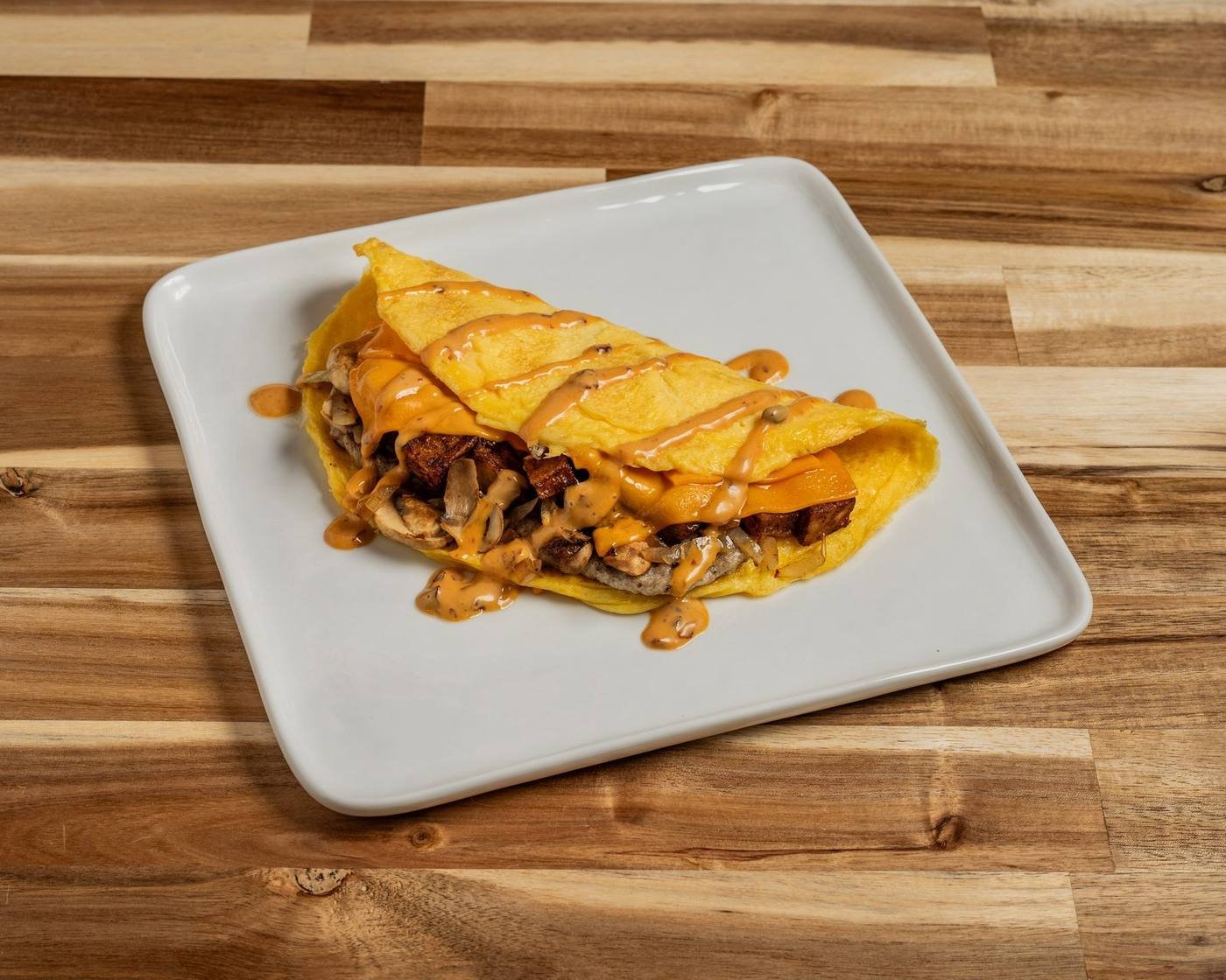 Cali omelette with bacon, tomato, avocado, and cheddar