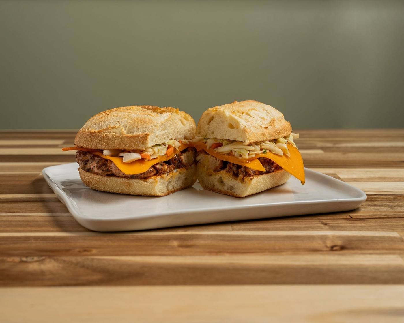 Mediterranean chicken sandwich with pickled onion